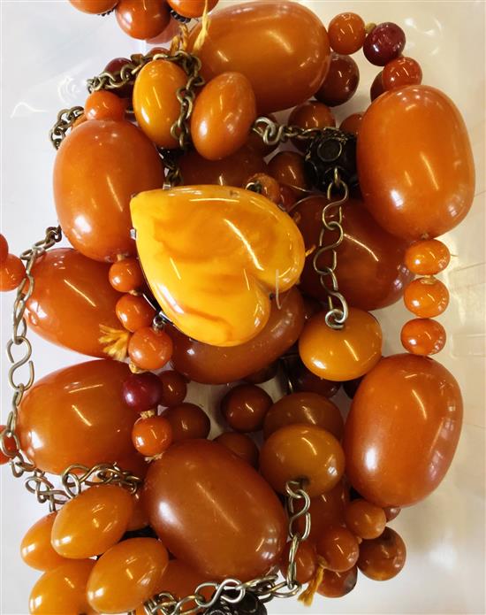 Necklaces including amberoid